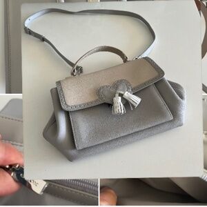 Leather bag with handle and crossbody strap